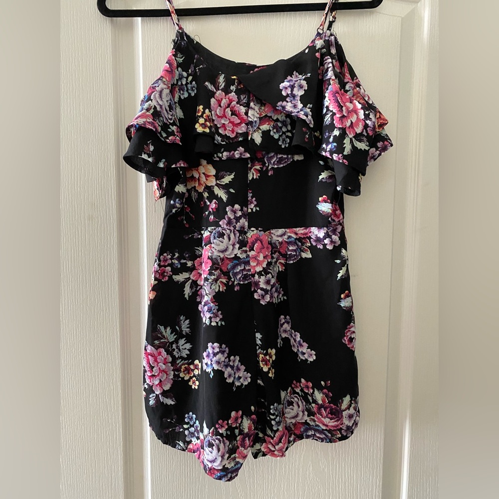 Romper from a boutique in south Florida.